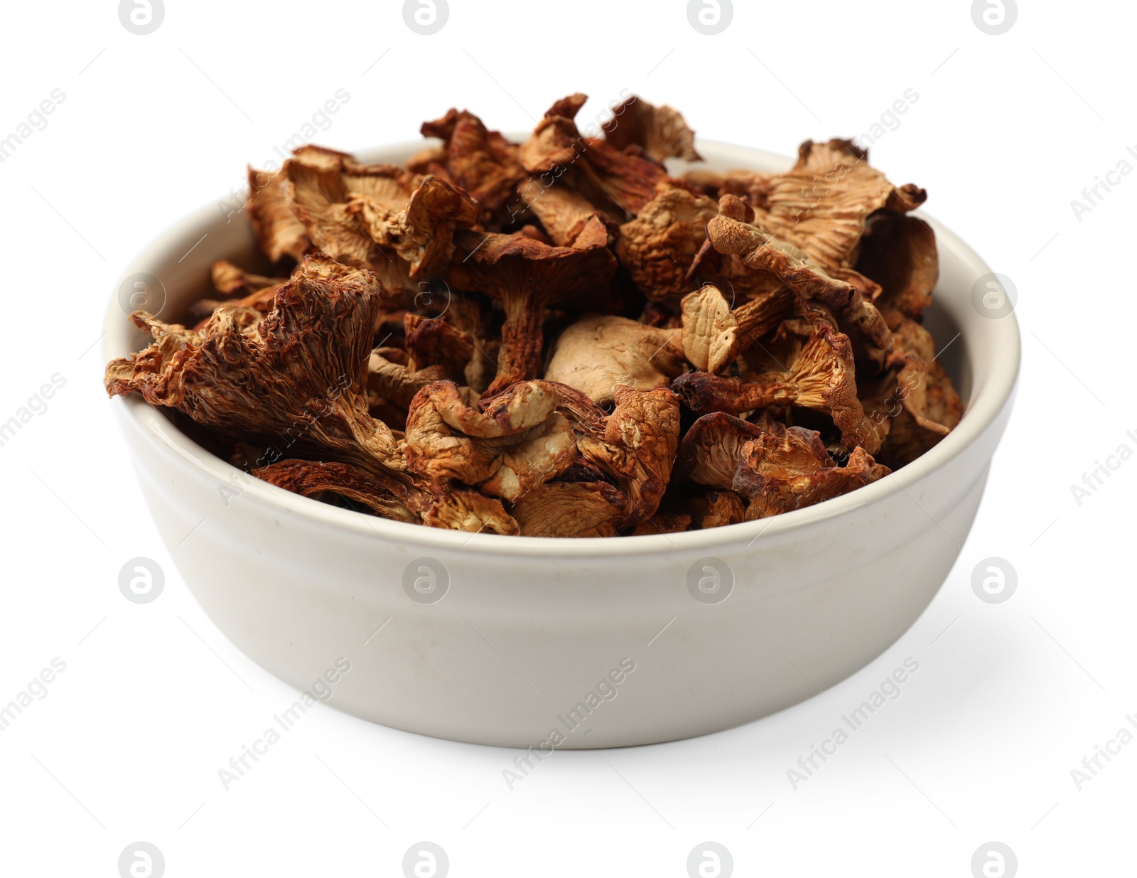 Photo of Dried chanterelle mushrooms in bowl isolated on white