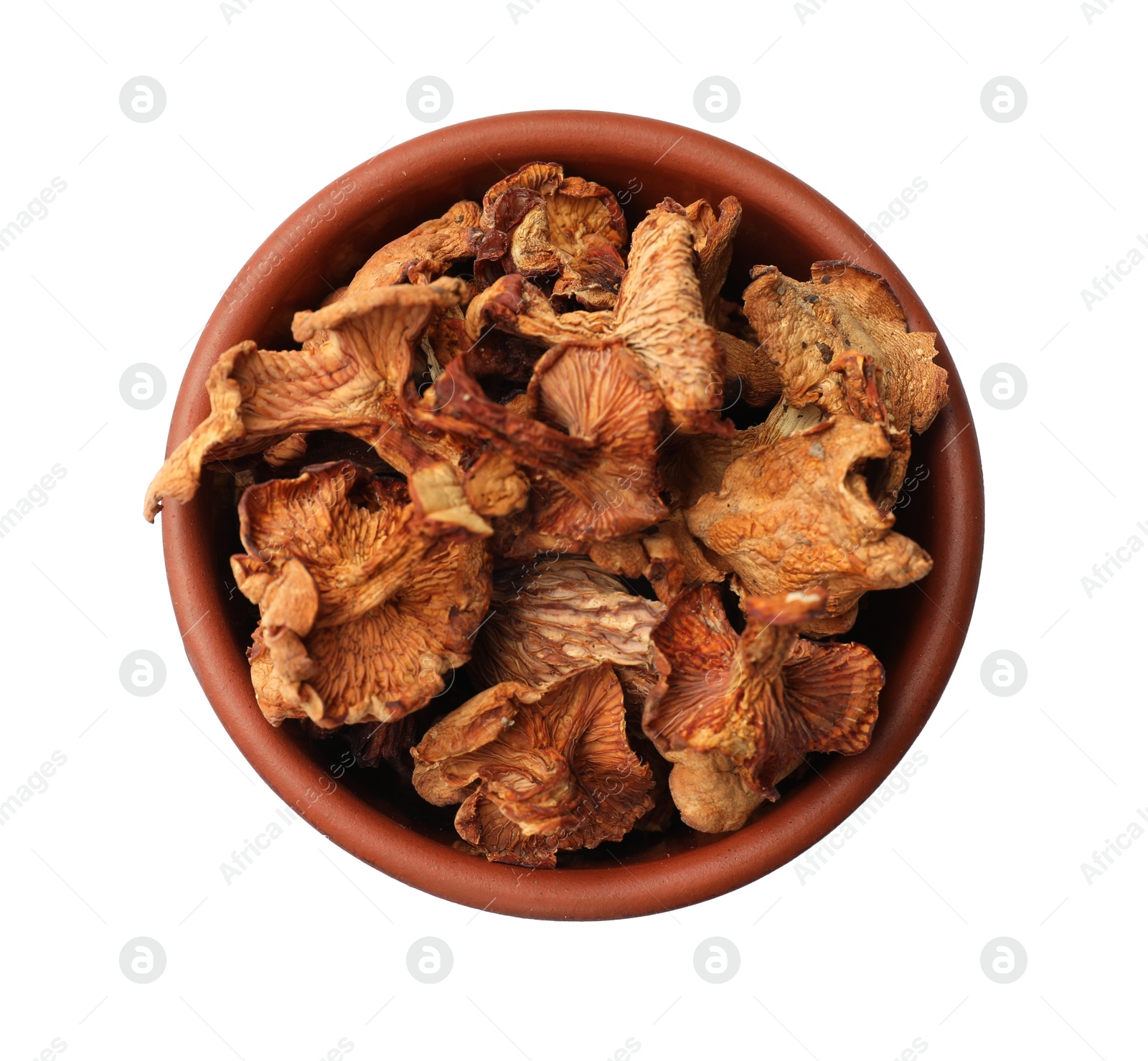 Photo of Dried chanterelle mushrooms in bowl isolated on white, top view