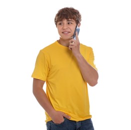 Photo of Smiling teenage boy talking by smartphone on white background
