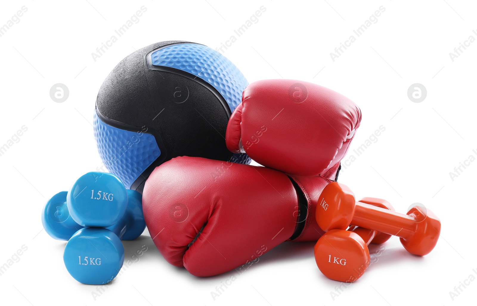 Medicine ball, dumbbells and boxing gloves isolated on white Photo of Medicine ball, dumbbells and boxing gloves isolated on white