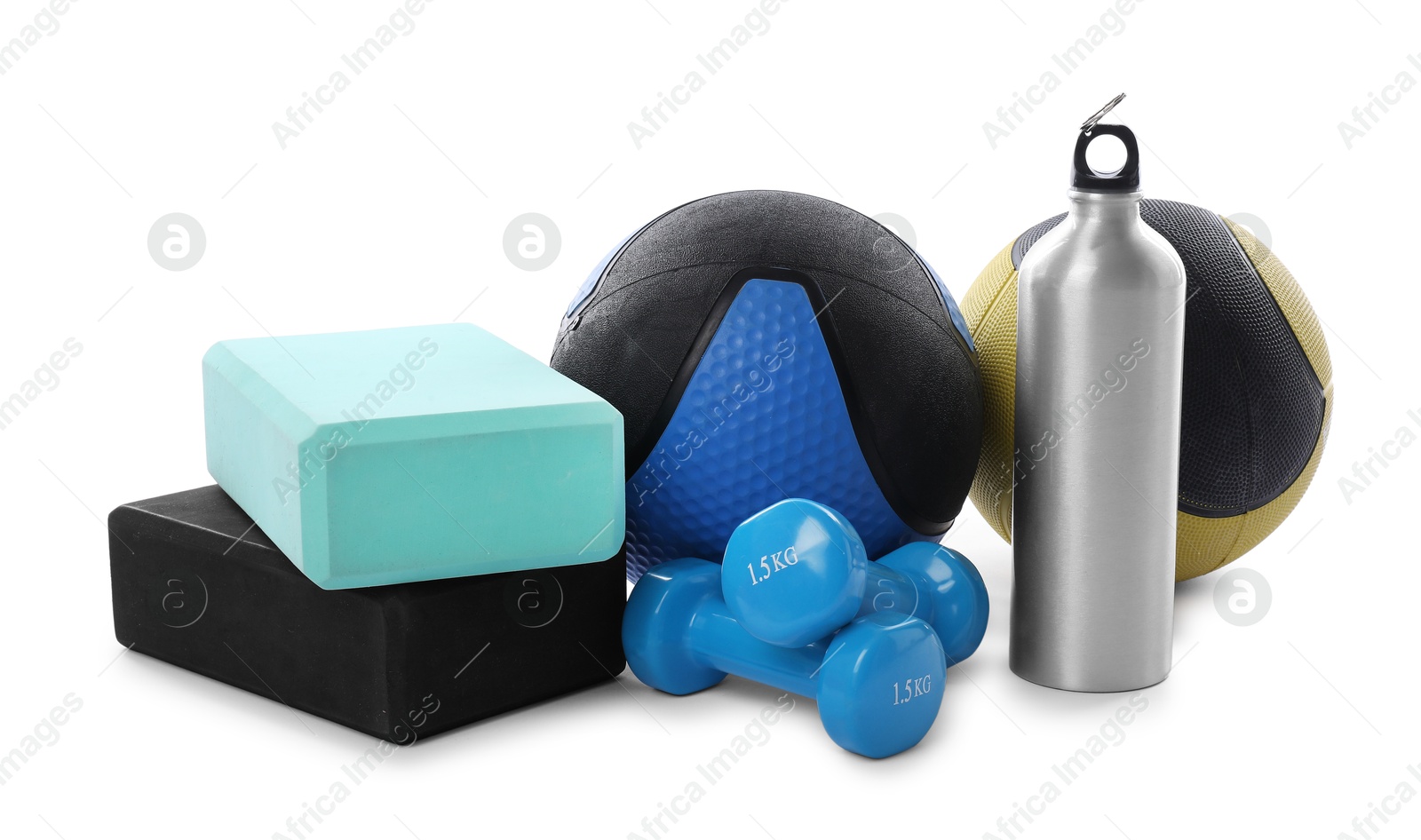 Medicine balls, dumbbells, water bottle and foam blocks isolated on white Photo of Medicine balls, dumbbells, water bottle and foam blocks isolated on white