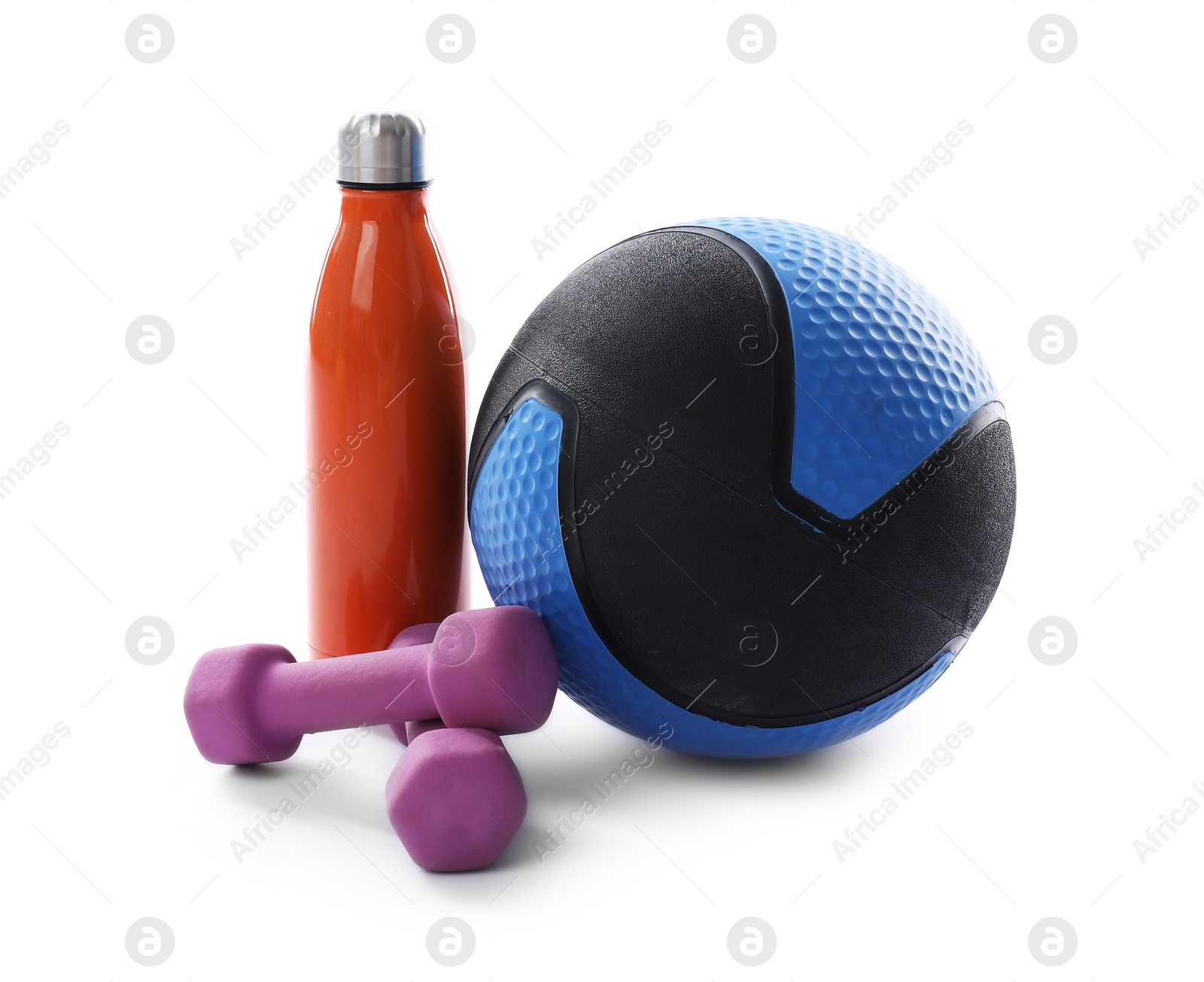 Medicine ball, dumbbells and water bottle isolated on white Photo of Medicine ball, dumbbells and water bottle isolated on white