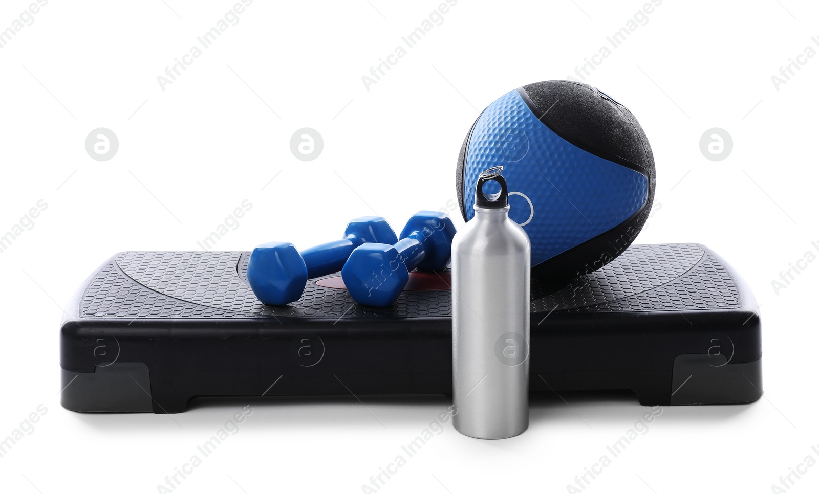 Medicine ball, dumbbells, water bottle and step platform isolated on white Photo of Medicine ball, dumbbells, water bottle and step platform isolated on white