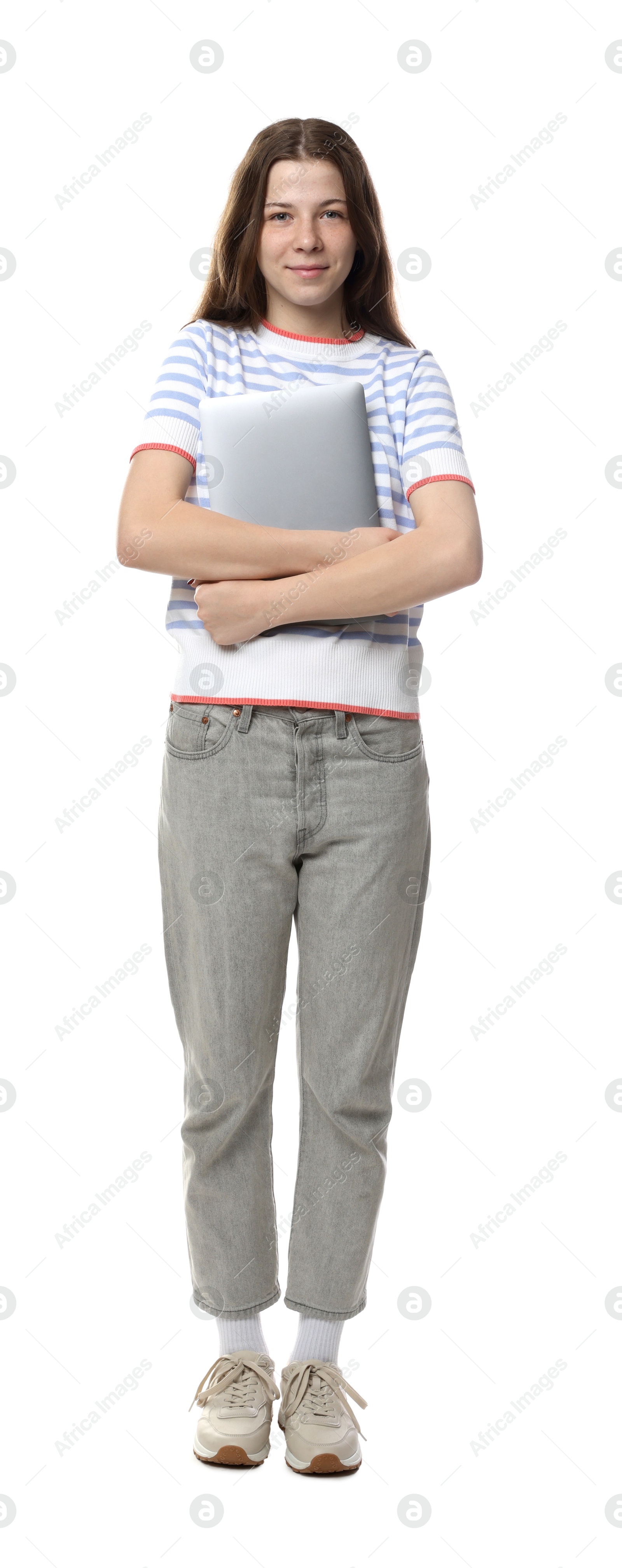 Teenage girl with laptop on white background Photo of Teenage girl with laptop on white background