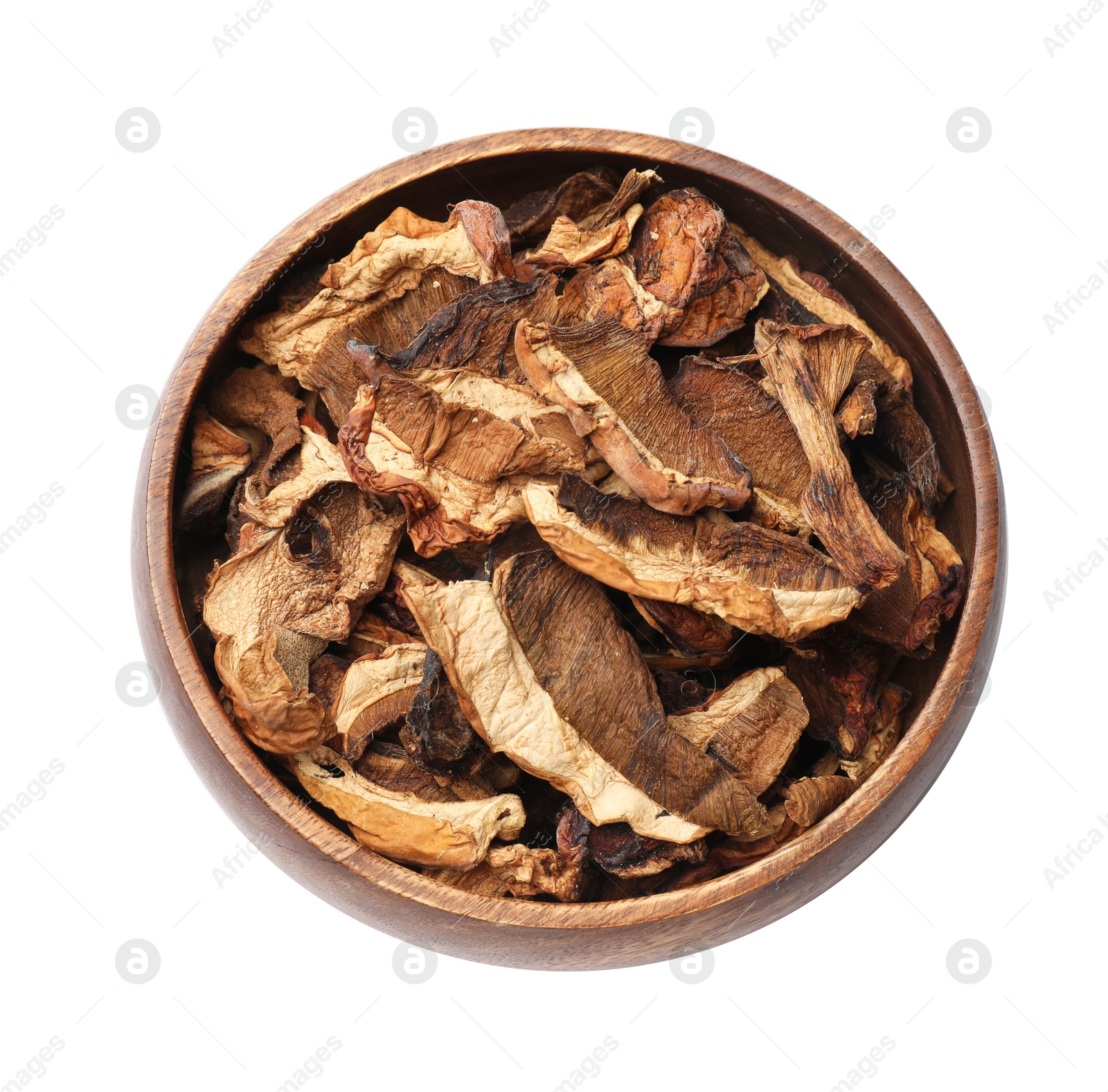 Photo of Pieces of dried mushrooms in bowl isolated on white, top view