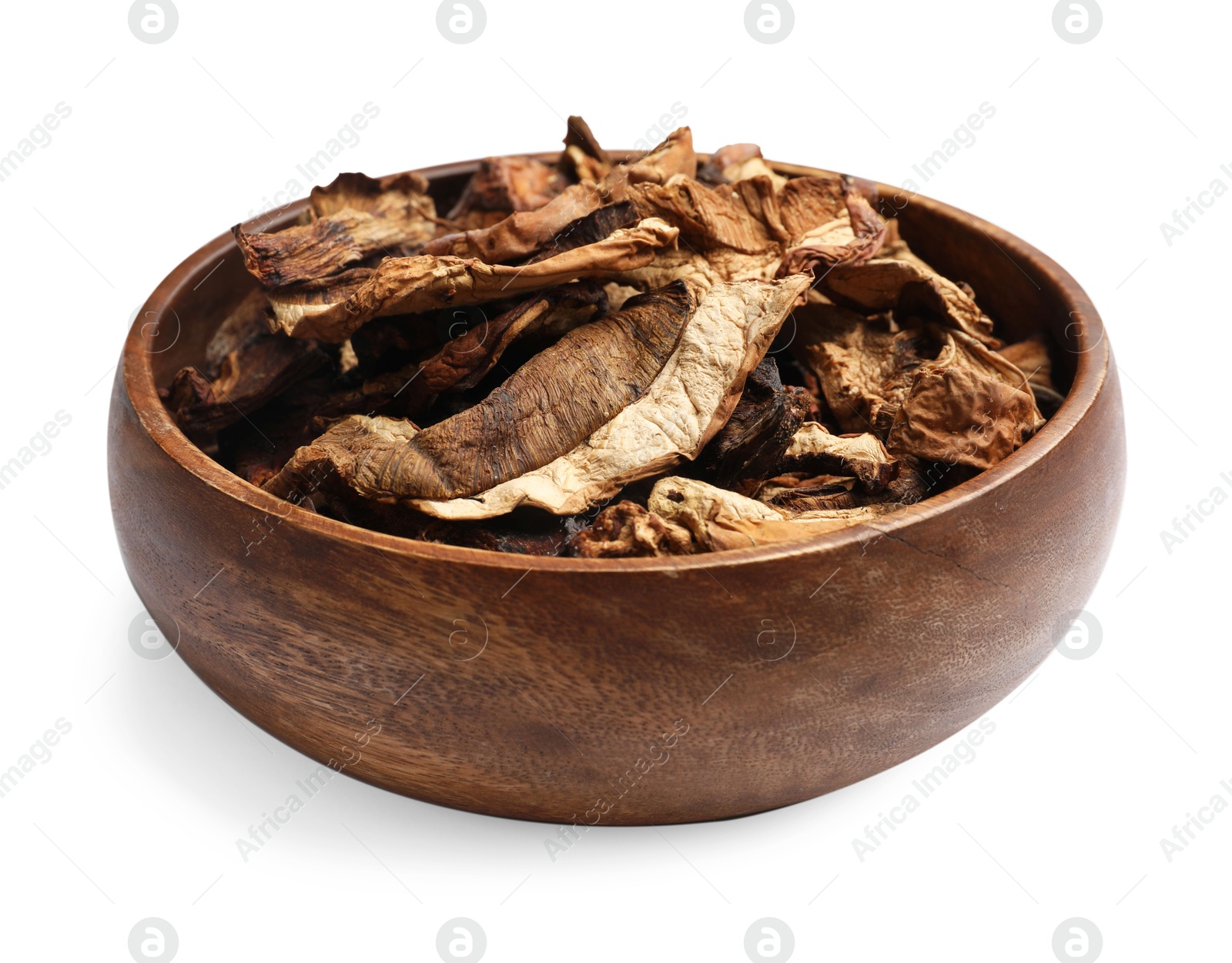 Pieces of dried mushrooms in bowl isolated on white Photo of Pieces of dried mushrooms in bowl isolated on white