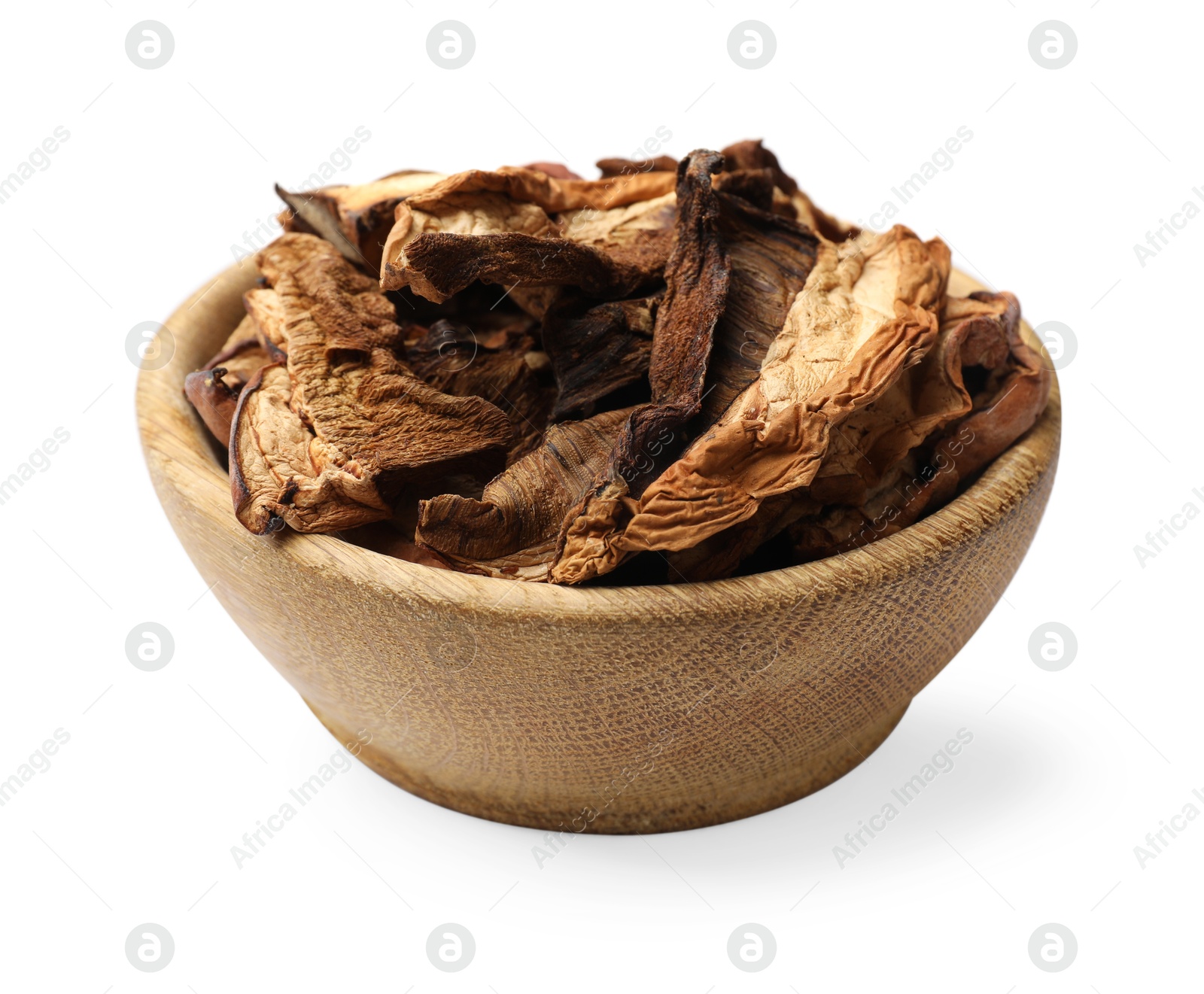 Pieces of dried mushrooms in bowl isolated on white Photo of Pieces of dried mushrooms in bowl isolated on white