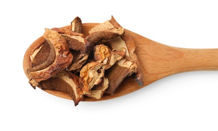 Photo of Pieces of dried mushrooms and spoon isolated on white, top view