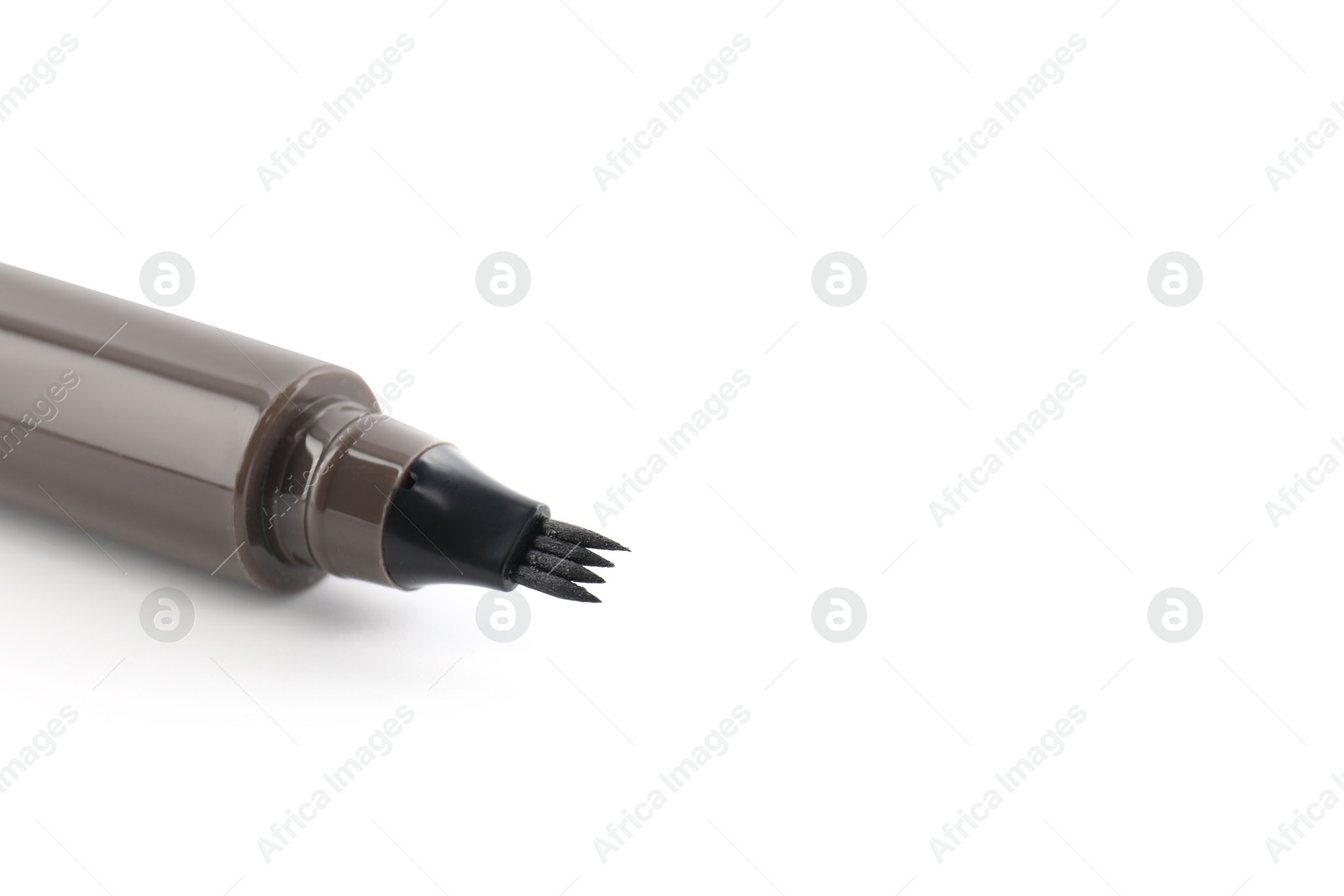 One liquid eyebrow pencil isolated on white Photo of One liquid eyebrow pencil isolated on white