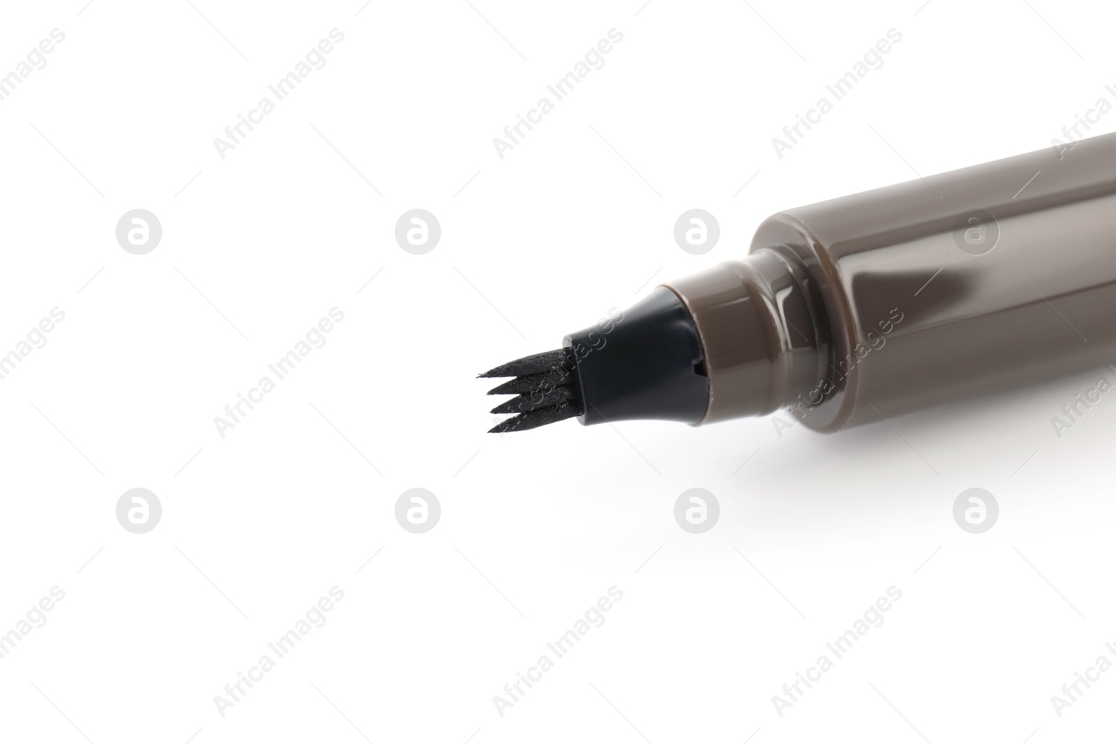 One liquid eyebrow pencil isolated on white Photo of One liquid eyebrow pencil isolated on white