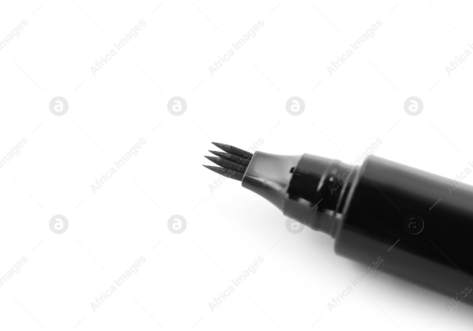 One liquid eyebrow pencil isolated on white Photo of One liquid eyebrow pencil isolated on white