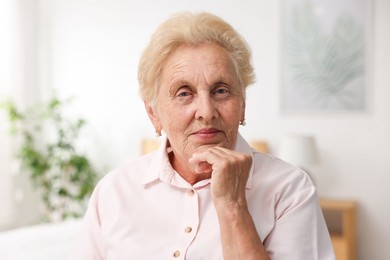 Photo of Portrait of beautiful senior woman at home