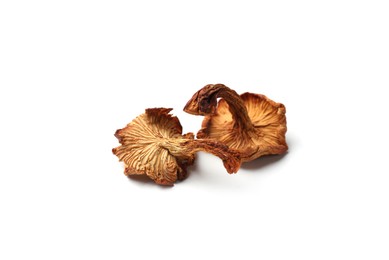 Photo of Two dried chanterelle mushrooms isolated on white