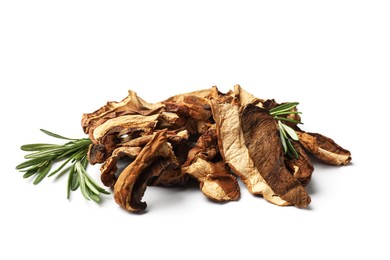 Photo of Pieces of dried mushrooms and rosemary isolated on white