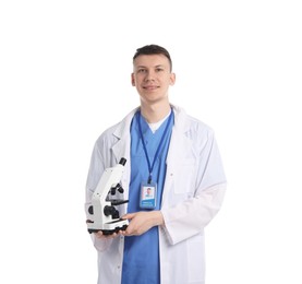 Photo of Medical student with microscope on white background