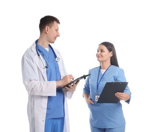 Photo of Medical students with clipboards on white background