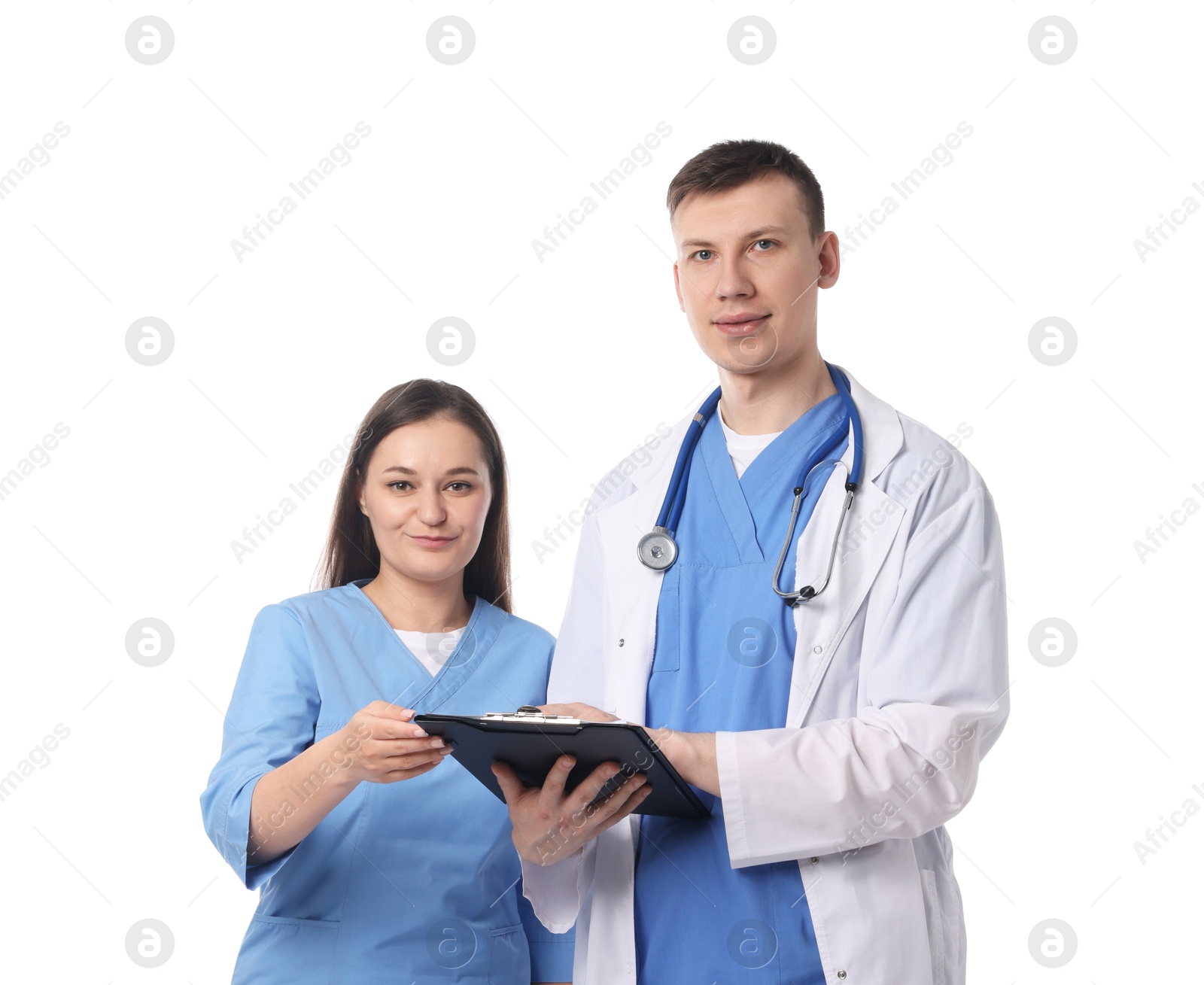 Photo of Medical students with clipboard on white background