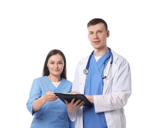 Photo of Medical students with clipboard on white background