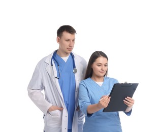 Photo of Medical students with clipboard on white background
