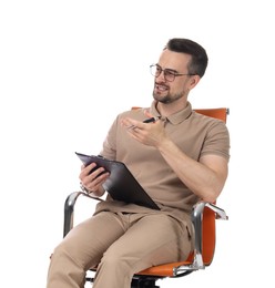 Photo of Professional psychologist with clipboard in armchair on white background