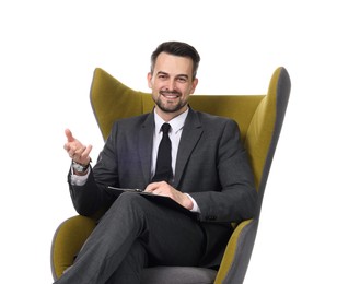 Photo of Professional psychologist with clipboard in armchair on white background