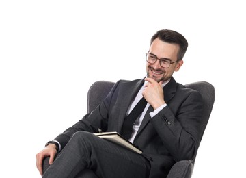 Photo of Professional psychologist with notebook in armchair on white background