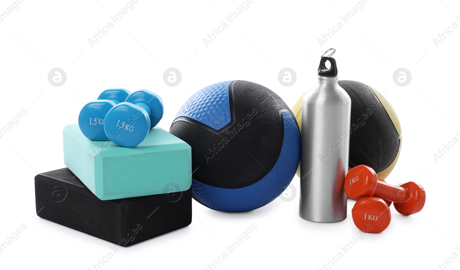 Medicine balls, dumbbells, water bottle and foam blocks isolated on white Photo of Medicine balls, dumbbells, water bottle and foam blocks isolated on white