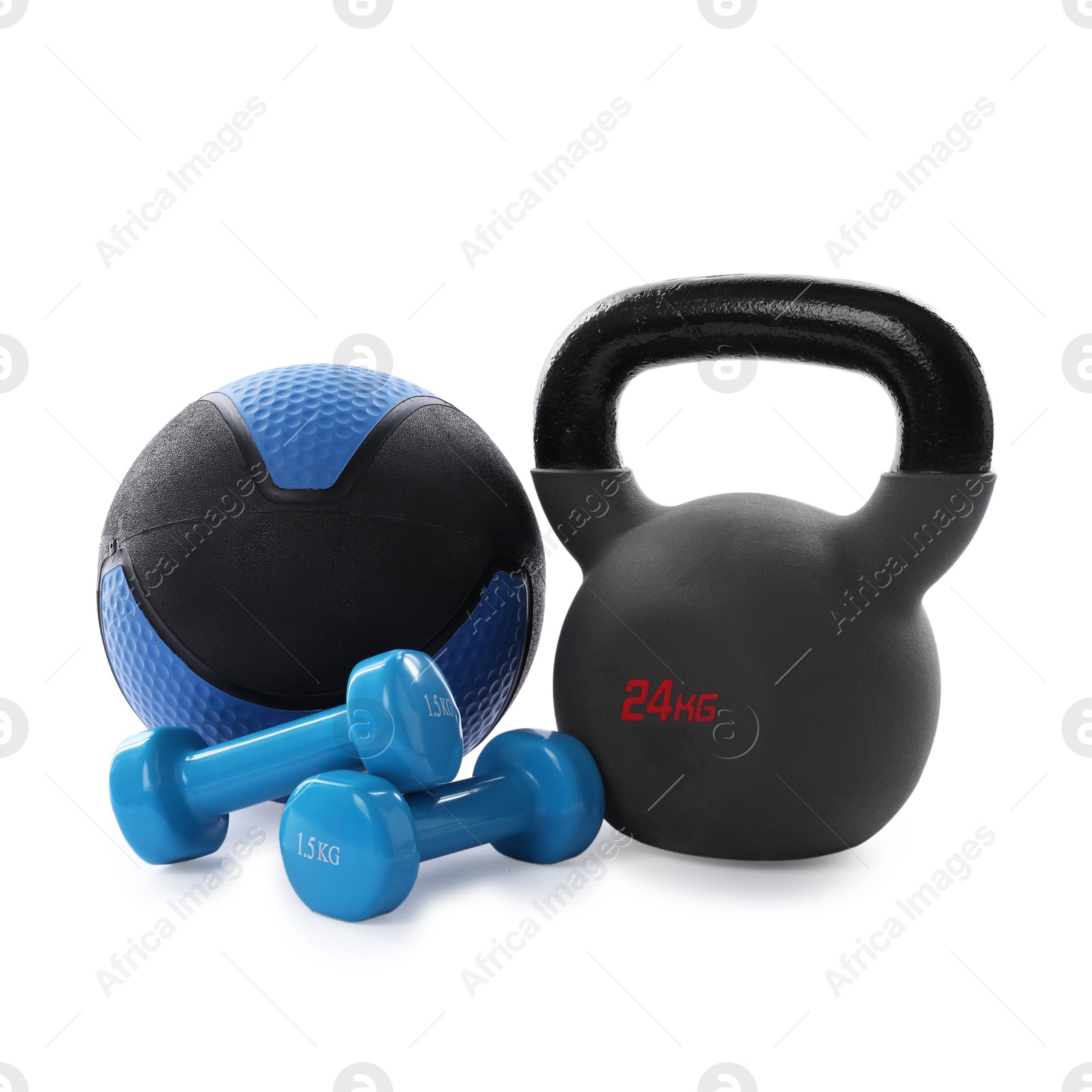 Medicine ball, kettlebell and dumbbells isolated on white Photo of Medicine ball, kettlebell and dumbbells isolated on white