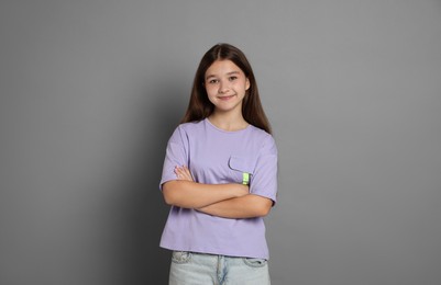 Photo of Portrait of teenage girl on grey background