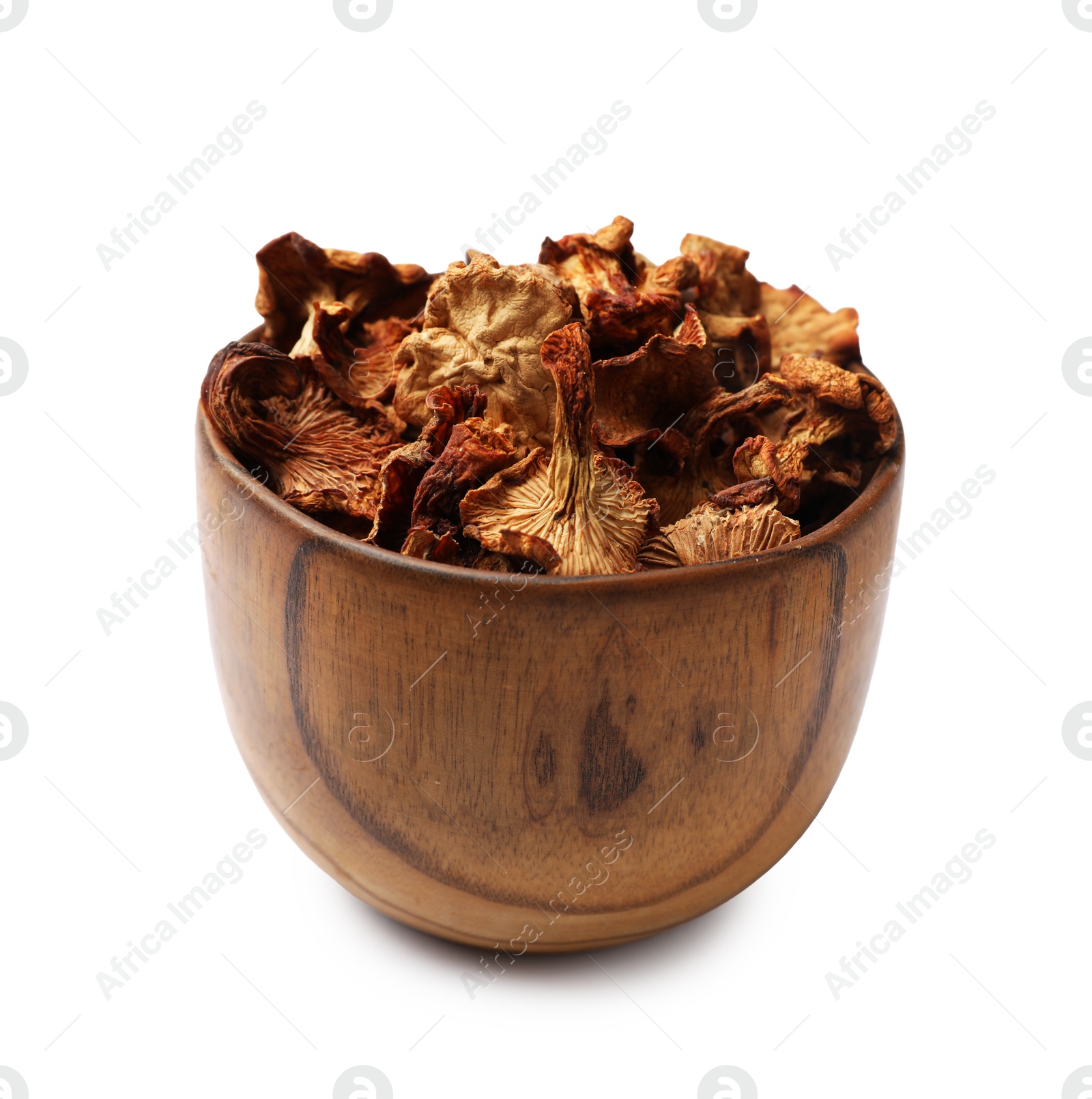 Dried chanterelle mushrooms in bowl isolated on white Photo of Dried chanterelle mushrooms in bowl isolated on white