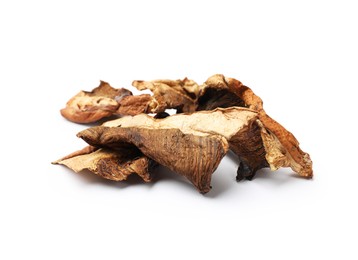 Photo of Pieces of dried mushrooms isolated on white
