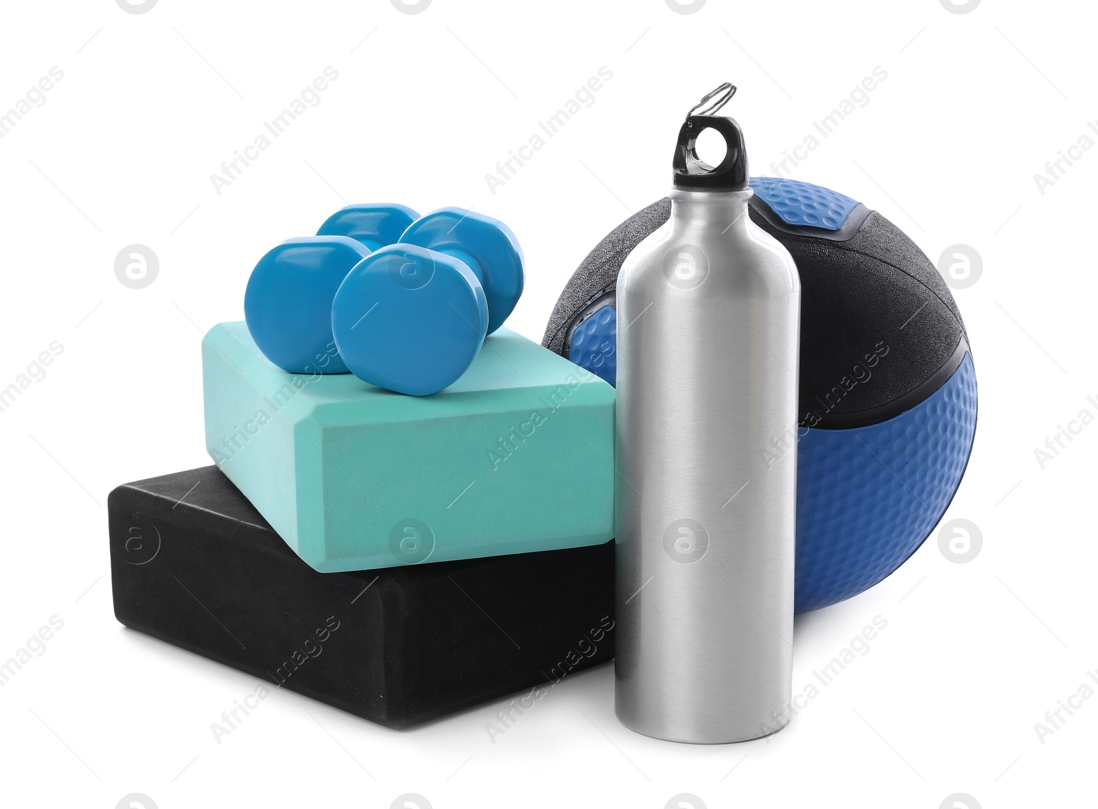 Medicine ball, dumbbells, water bottle and foam blocks isolated on white Photo of Medicine ball, dumbbells, water bottle and foam blocks isolated on white