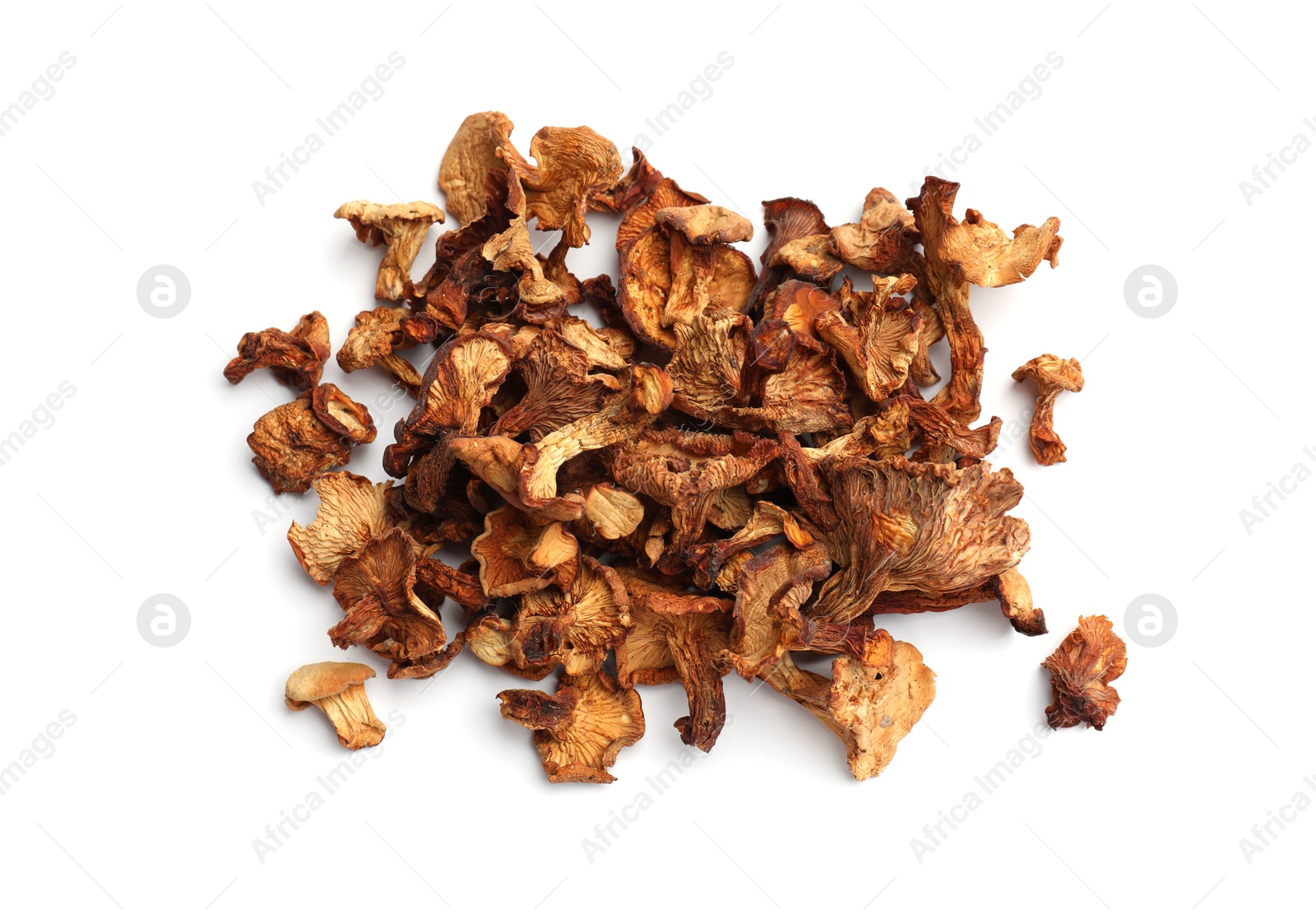 Many dried chanterelle mushrooms isolated on white, top view Photo of Many dried chanterelle mushrooms isolated on white, top view