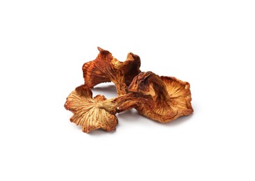 Photo of Many dried chanterelle mushrooms isolated on white
