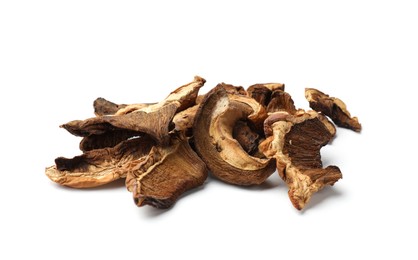 Photo of Pieces of dried mushrooms isolated on white