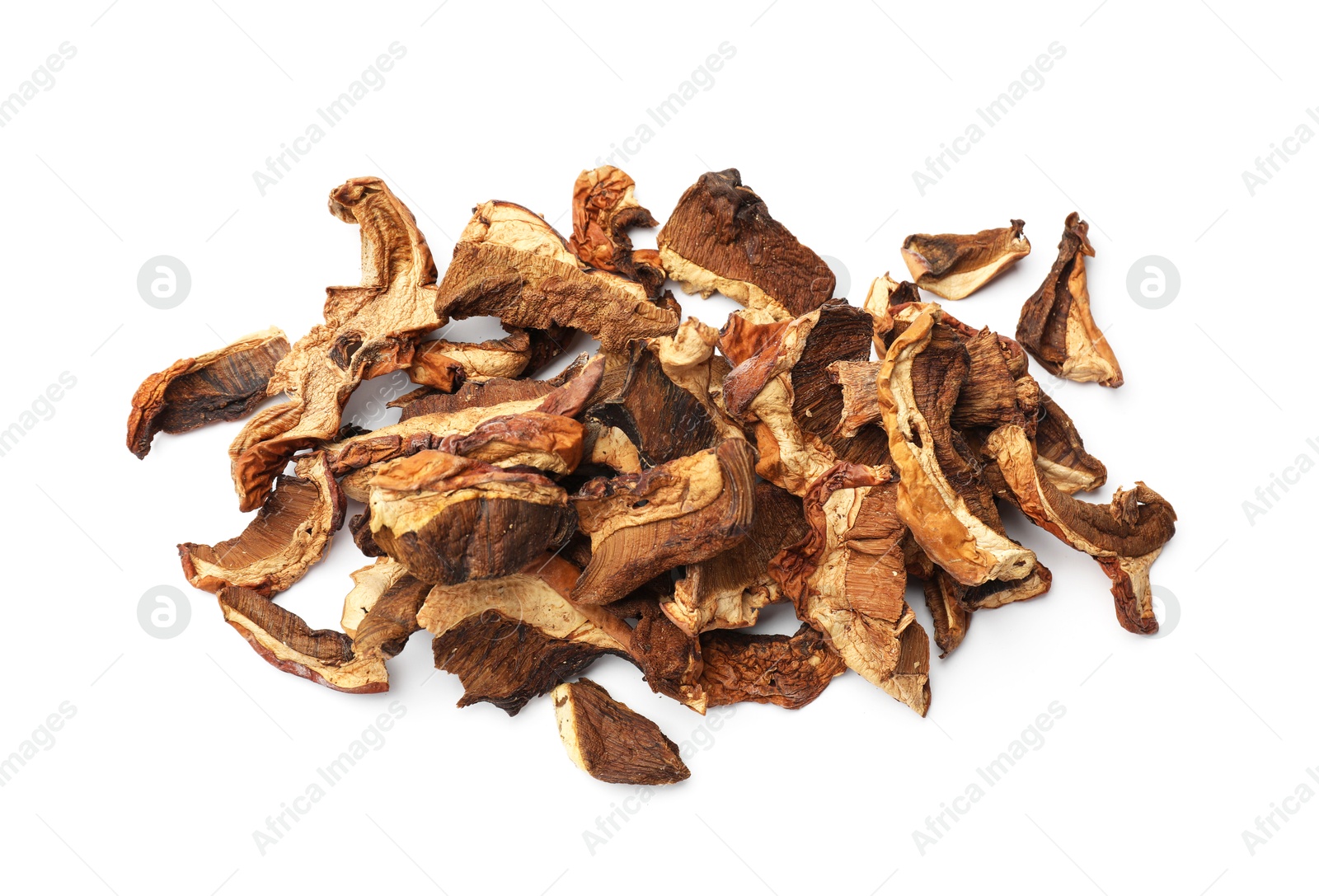Photo of Pieces of dried mushrooms isolated on white, top view