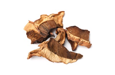 Photo of Pieces of dried mushrooms isolated on white, top view