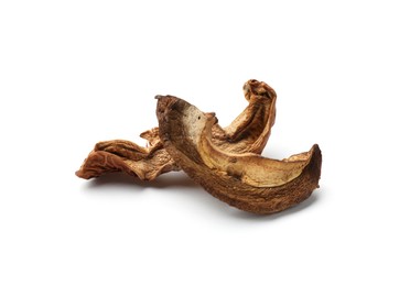 Photo of Pieces of dried mushrooms isolated on white