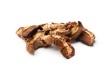 Photo of Pieces of dried mushrooms isolated on white