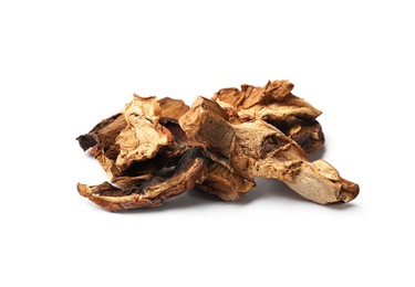Photo of Pieces of dried mushrooms isolated on white