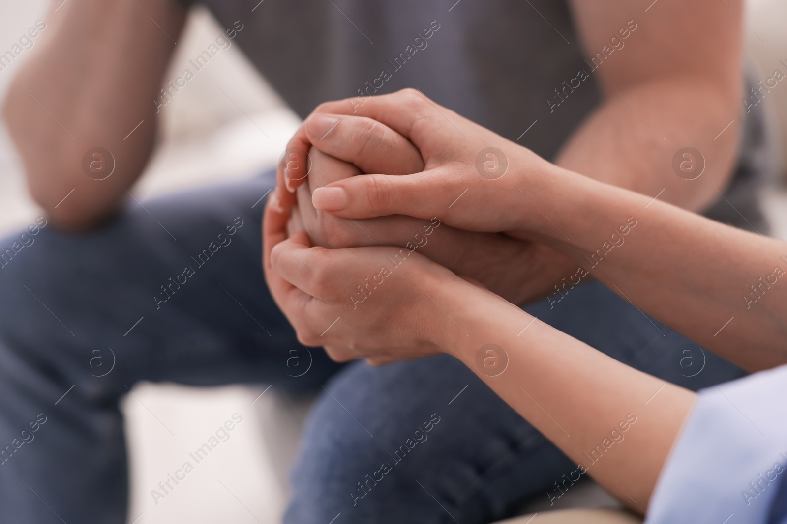 Psychologist supporting patient during therapy session in office, closeup Photo of Psychologist supporting patient during therapy session in office, closeup