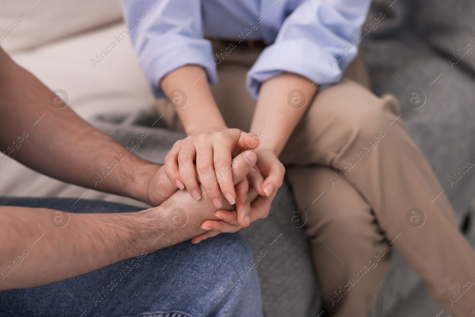 Psychologist supporting patient during therapy session on sofa in office, above view Photo of Psychologist supporting patient during therapy session on sofa in office, above view
