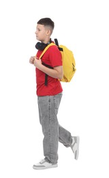 Photo of Teenage boy with headphones and backpack on white background
