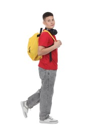 Photo of Teenage boy with headphones and backpack on white background