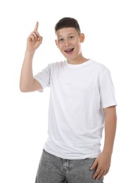Photo of Teenage boy pointing at something on white background