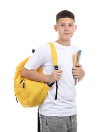 Photo of Teenage boy with notebooks and backpack on white background