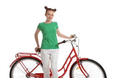 Photo of Teenage girl with red bicycle on white background