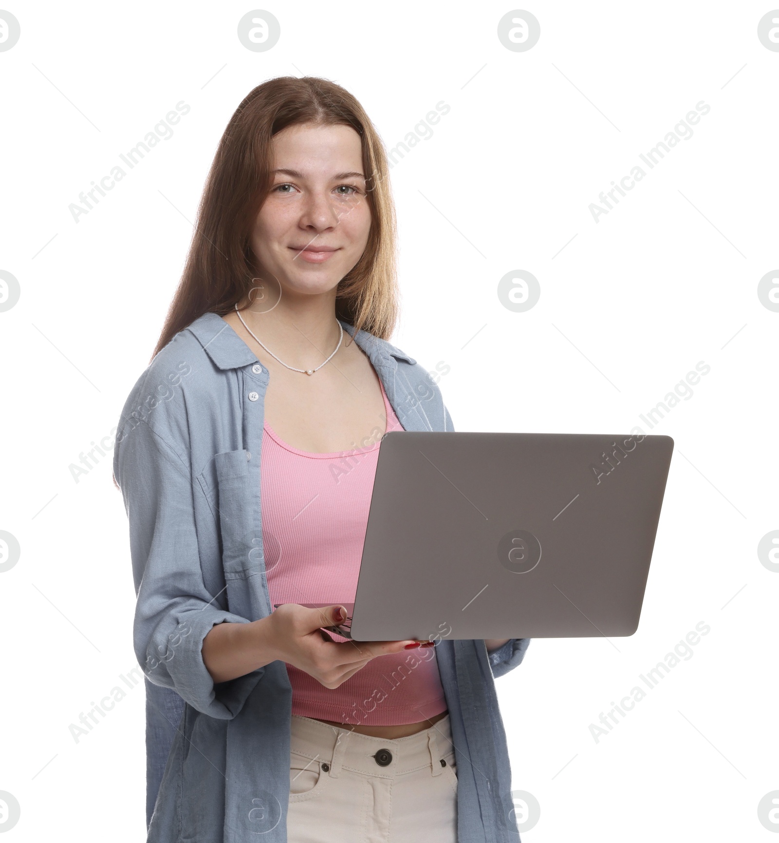 Teenage girl with laptop on white background Photo of Teenage girl with laptop on white background