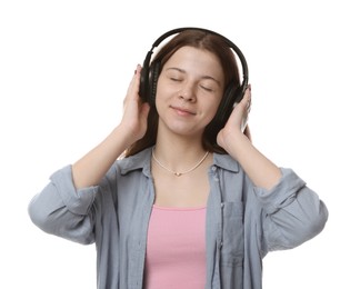 Photo of Teenage girl in headphones on white background