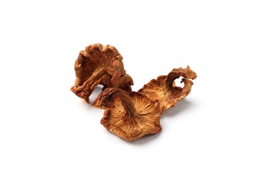 Photo of Many dried chanterelle mushrooms isolated on white